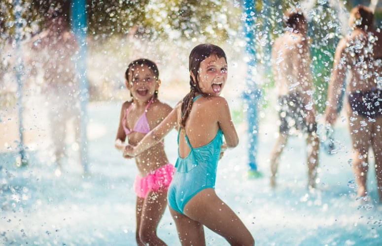 kids playing in splash pad