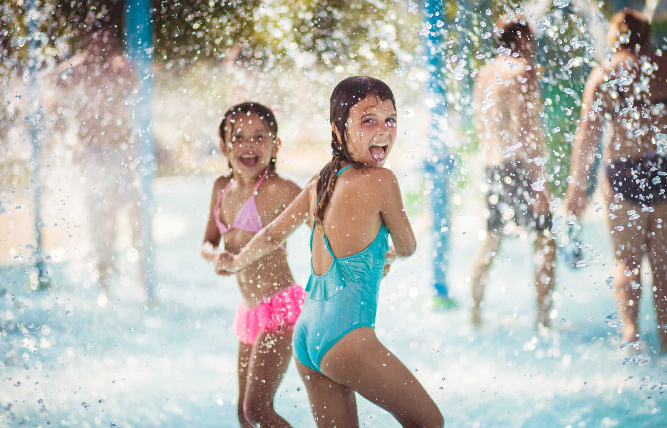 kids playing in splash pad