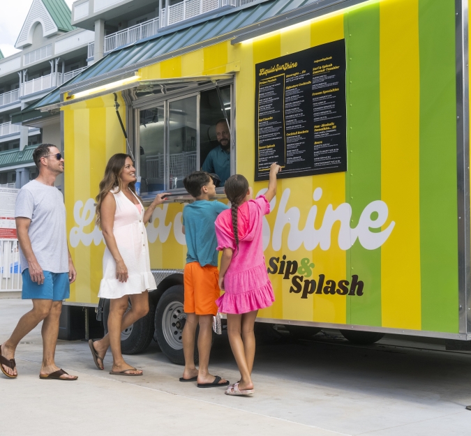 A family of four orders from the Liquid Sunshine food truck