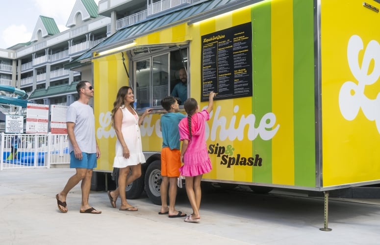 A family of four orders from the Liquid Sunshine food truck